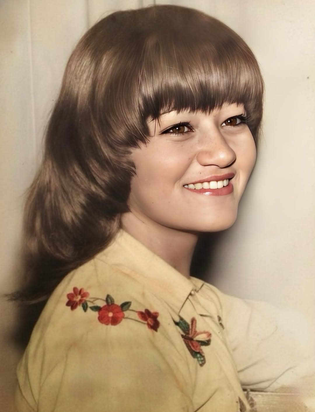 Restored and colorized portrait of young woman